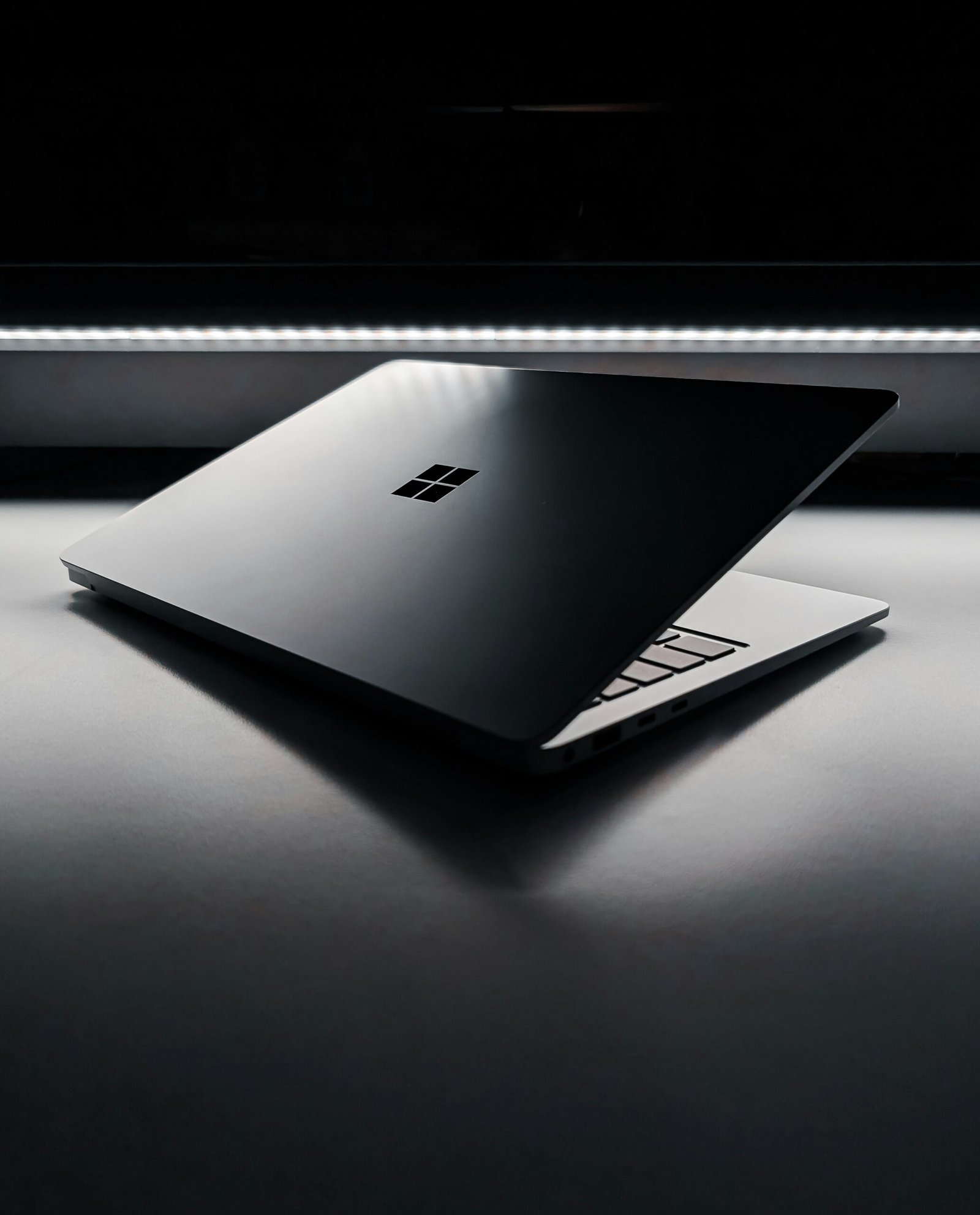 A laptop computer sitting on top of a table